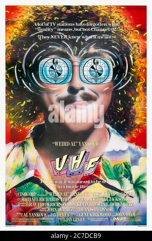 UHF (1989) directed by Jay Levey and starring Weird Al' Yankovic, Victoria Jackson, Kevin McCarthy and Michael Richards. Cult classic about a strange dreamer who manages a local TV station that starts to fill the schedule with weird programs that find an audience. Stock Photo