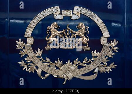 Sign trade brand of Belmond Venice Simplon Orient Express luxury train stoped at Venezia Santa Lucia railway station the central railway station in Ve Stock Photo
