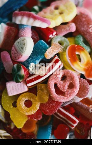 Vertical closeup shot of delicious colorful gummy candy with different forms Stock Photo
