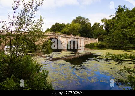 The repaired Clumber Park ornamental bridge after extensive vandalism damage. During the Covid 19 pandemic. Stock Photo