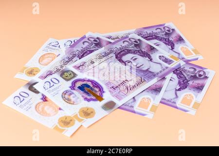 New plastic polymer British, English £20 pound notes Stock Photo