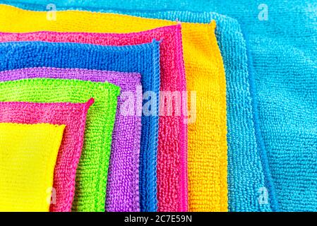 Background made of different colors of microfiber material superimposed on each other, in the shape of a square. Stock Photo
