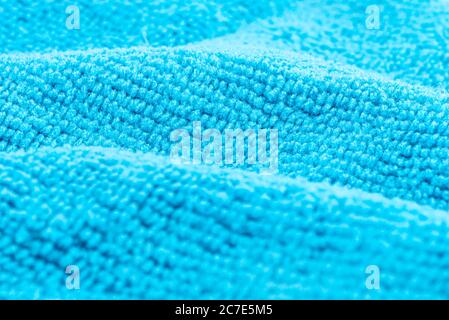 Background made of light blue microfiber fabric, selective focus. Stock Photo