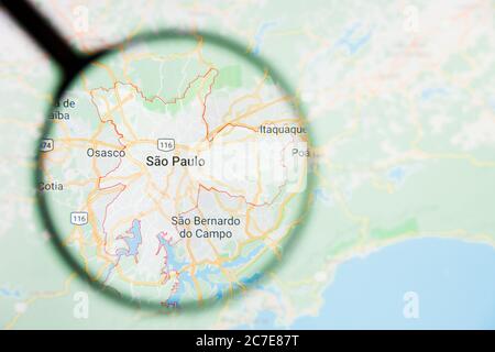 Sao Paulo, Brazil city visualization illustrative concept on display screen through magnifying glass Stock Photo