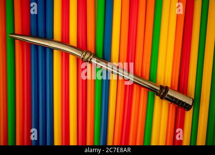 Stainless reusable straw over plastic straws. Say no to plastic Stock Photo