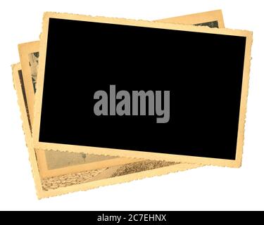 stack of old photos, yellowed and bleeched, free space for pix, isolated on white Stock Photo