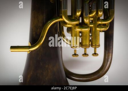 Closeup shot of a tuba musical instrument valves and the mouthpiece Stock Photo