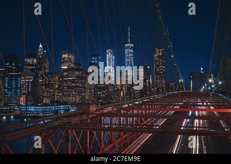 High shot from Brooklyn Bridge of the New York cityscape during the night Stock Photo