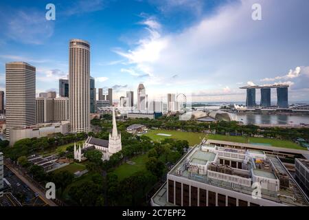 Panorama of Singapore business district skyline and office skyscraper with nice sky cloud in Marina bay, Singapore. Asian tourism, modern city life, o Stock Photo