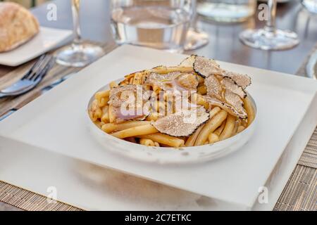 Pasta with autumn black truffles Stock Photo