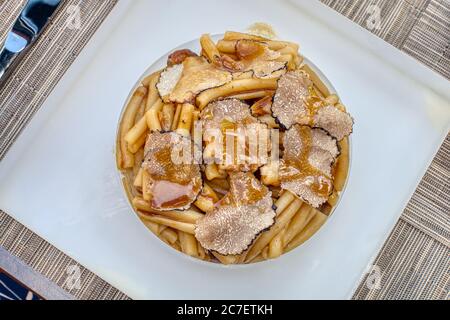 Pasta with autumn black truffles Stock Photo