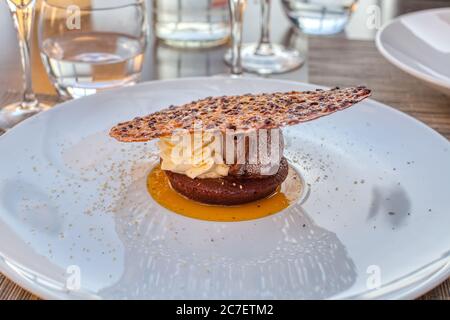 Chocolate ice cream with vanilla cream, cookie and chips Stock Photo