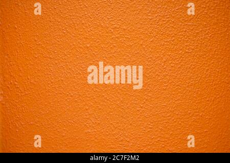 Saturated intensive orange textured surface. Stock Photo