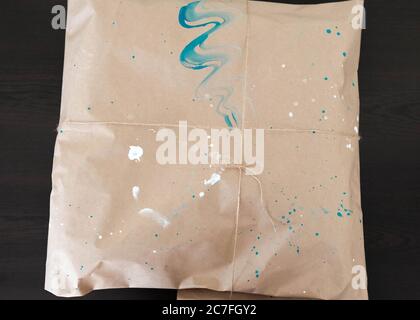 Brown Paper Package Tied with thin Rope string bow Torn Open on White  Background Copy space Stock Photo - Alamy