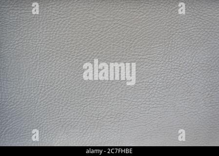 Light gray leather smooth surface. Backgrounds and textures. Stock Photo