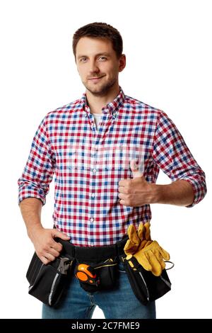 caucasian repairman worker wearing tool belt showing Ok gesture isolated on white studio background Stock Photo