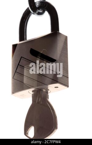 Isolated photo of a padlock with a container reflection on it - perfect for security concept Stock Photo