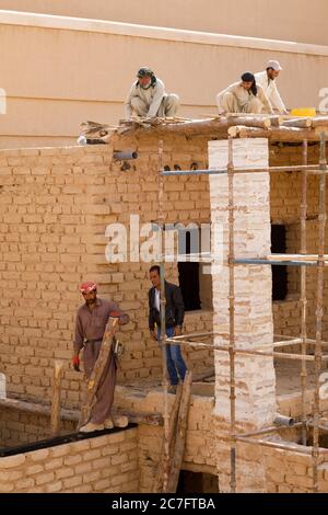 Raghba, Saudi Arabia, February 16 2020: Construction workers during work at the fort near Raghba, Saudi Arabia. The fort is currently undergoing exten Stock Photo