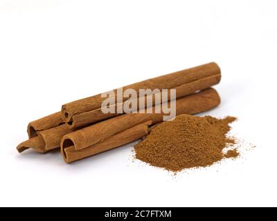 Cinnamon sticks isolated against a white background Stock Photo