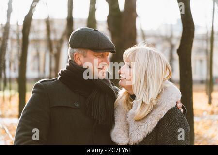 Happy blonde mature woman and handsome middle-aged brunette man Stock Photo