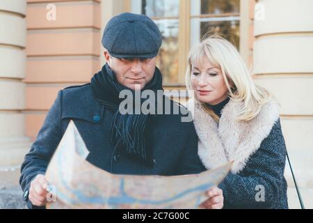 Happy blonde mature woman and handsome middle-aged brunette man Stock Photo
