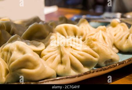Georgian khinkali on the table Stock Photo