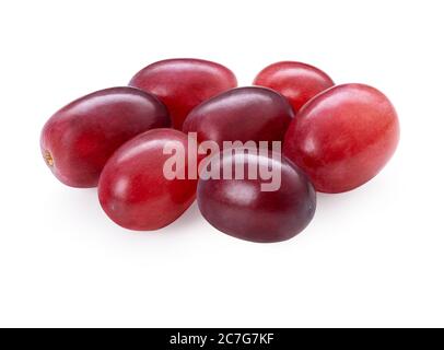Grape bunch isolated on white background. Sweet ripe fresh pink fruit. Heap of red cardinal grapes. Clipping path. Stock Photo