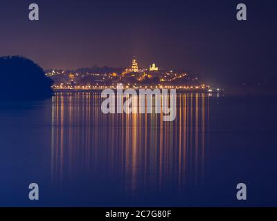 Night view of Zemun municipality of Belgrade, capital of Serbia, reflecting in the Danube river Stock Photo