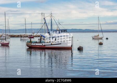 Sailing boats on the water near old fishermans wharf captured in Monterey, United States Stock Photo