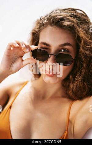 Looking Over Sunglasses stock photo. Image of shade, black - 437410