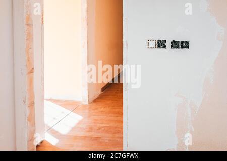 Room of a house in rehabilitation, reform of the electrical switchboards. Stock Photo