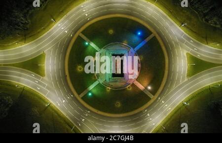 Colorful roundabout road at night time above top view Stock Photo