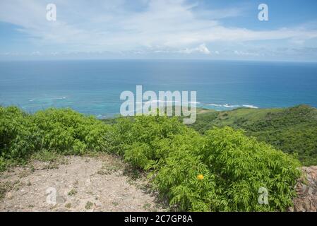 View of the lush greenery and Caribbean Sea from the Goat Hill hike on the East End of St. Croix in the US Virgin Islands Stock Photo