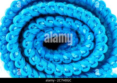 Background made of light blue curled microfiber material, front view, macro shot. Stock Photo