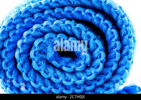 Background made of blue curled microfiber material, front view, macro shot. Stock Photo