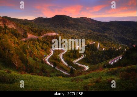 View of Winding road in sunset in Gunma prefecture, Japan Stock Photo