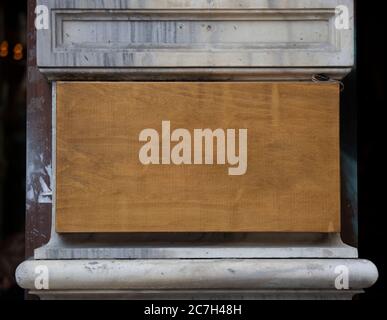 close up of an empty wooden sign on white background Stock Photo