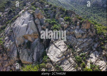 Gigantic rock formations between the forests in the Gorropu canyon, the most important natural site in Sardinia, Italy Stock Photo