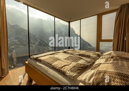 Europe, Austria, Tyrol, East Tyrol, Lienz, rooms on the Dolomitenhütte with huge panoramic windows Stock Photo