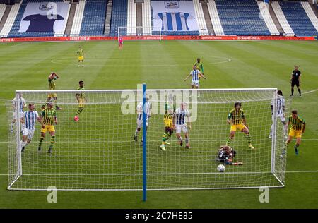 West Bromwich Albion's Dara O'Shea (right) scores his side's first goal of the game during the Sky Bet Championship match at the John Smith's Stadium, Huddersfield. Stock Photo