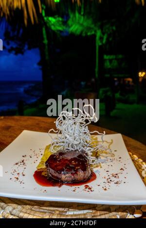 America, Caribbean, Greater Antilles, Dominican Republic, Cabarete, dinner on the beach at the Natura Cabana Boutique Hotel & Spa Stock Photo