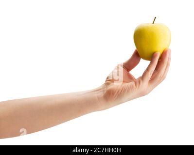 golden delicious apple in hand path isolated on white Stock Photo