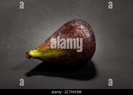 single fig on black background Stock Photo