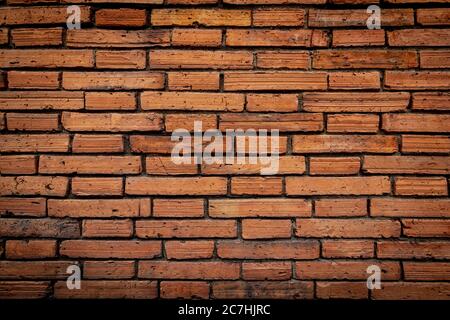 Beautiful brick walls that are not plastered background and texture. Background of old vintage brick walls. Stock Photo