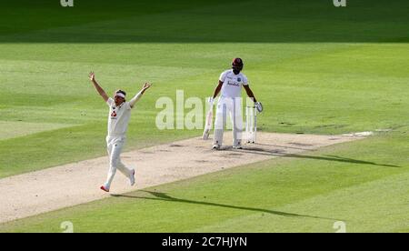 England's Sam Curran successfully appeals for the wicket of West Indies' John Campbell during day two of the Second Test at Old Trafford, Manchester. Stock Photo