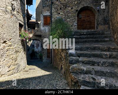 Stone walls, stone houses, Middle Ages, passage, gate, rocks, cobblestones Stock Photo