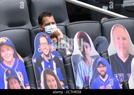 New York Mets general manager Brodie Van Wagenen walks out the