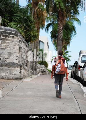 A resident schoolboy walks to school in Hamilton, Bermuda Stock Photo