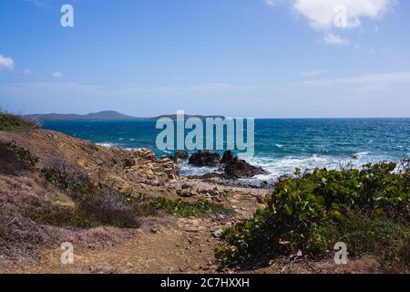 View of the Caribbean Sea from a remote dirt path to beach in Vieques, Puerto Rico Stock Photo