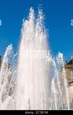 A fountain in the Amalie Garden in Copenhagen, Denmark in a summer day Stock Photo